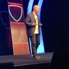 MIT researcher Andrew McAfee addresses this week's Intel Security 2016 Partner Summit.